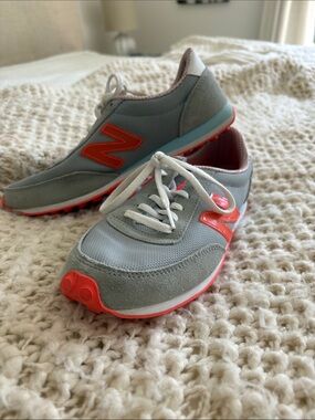 New Balance Gray and Coral Athletic Sneakers - Classic Logo Design